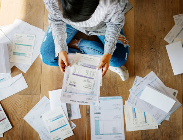 A professional bankruptcy attorney at our law offices in Huntington Beach, California, explaining the bankruptcy process to people filing for unsecured debt relief under the bankruptcy code