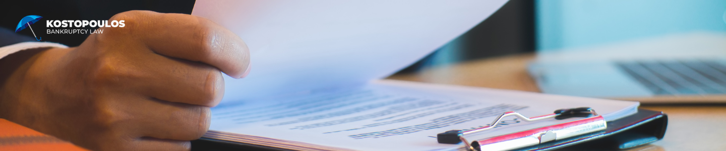 An image of a person meeting with a bankruptcy attorney to discuss whether filing bankruptcy is the best option to stop wage garnishment for their unpaid debts, including credit card debt and medical bills.