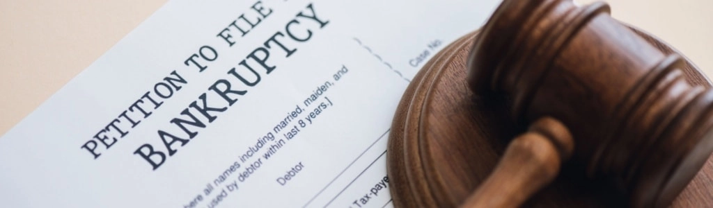 Bankruptcy petition beside a judge's gavel